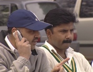 baseball cap mobile phone user - Google Search