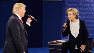 Republican presidential nominee Donald Trump and Democratic presidential nominee Hillary Clinton speak during the second presidential debate at Washington University in St. Louis, Sunday, Oct. 9, 2016. (AP Photo/John Locher)