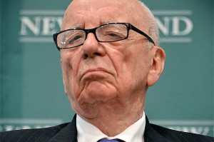 News Corporation CEO Rupert Murdoch applauds during a forum on The Economics and Politics of Immigration where Murdoch and New York Mayor Michael Bloomberg spoke to a business organization In Boston, Tuesday, Aug. 14, 2012. (AP Photo/Josh Reynolds)